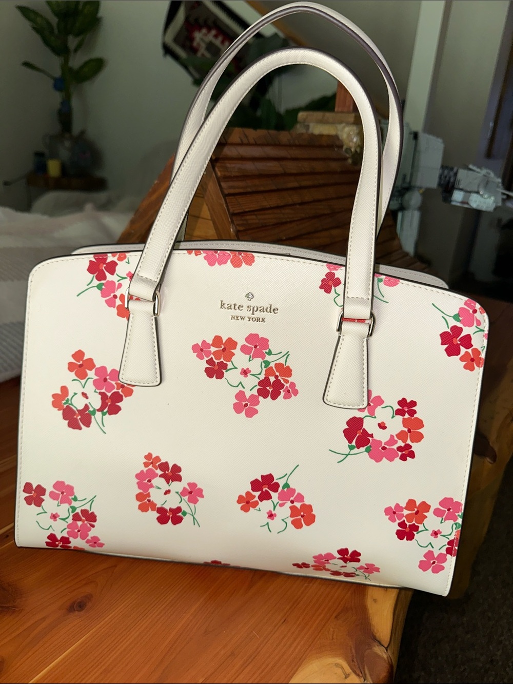 kate spade cream satchel with pink and red floral print